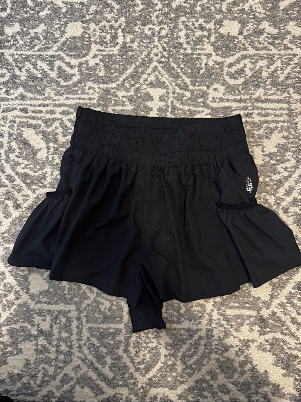 FP Movement by Free People Black Smocked Waist Ruffle Hem Active Shorts